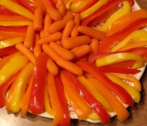 Bring a vegetable platter with a Greek-yogurt based dip, so you can be sure there will be a healthy snack option at a potluck.