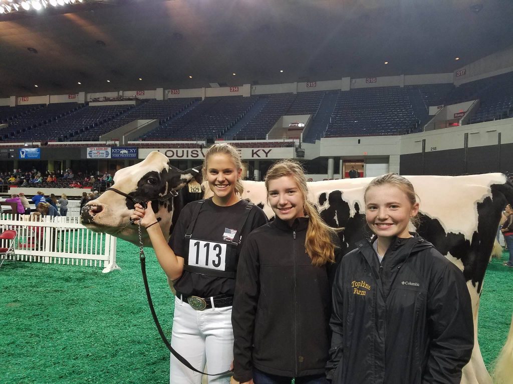 Kaicey Conant and Megan Caruso and their friend Emily Fisher of New Hampshire ringside on Kaicey's show day.