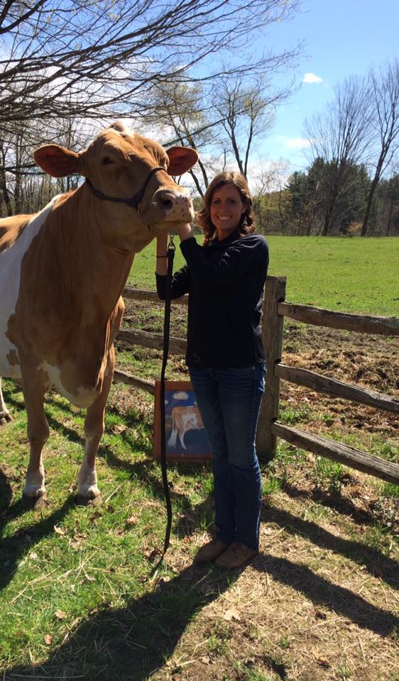 Ashley and one of her prized Guernseys.